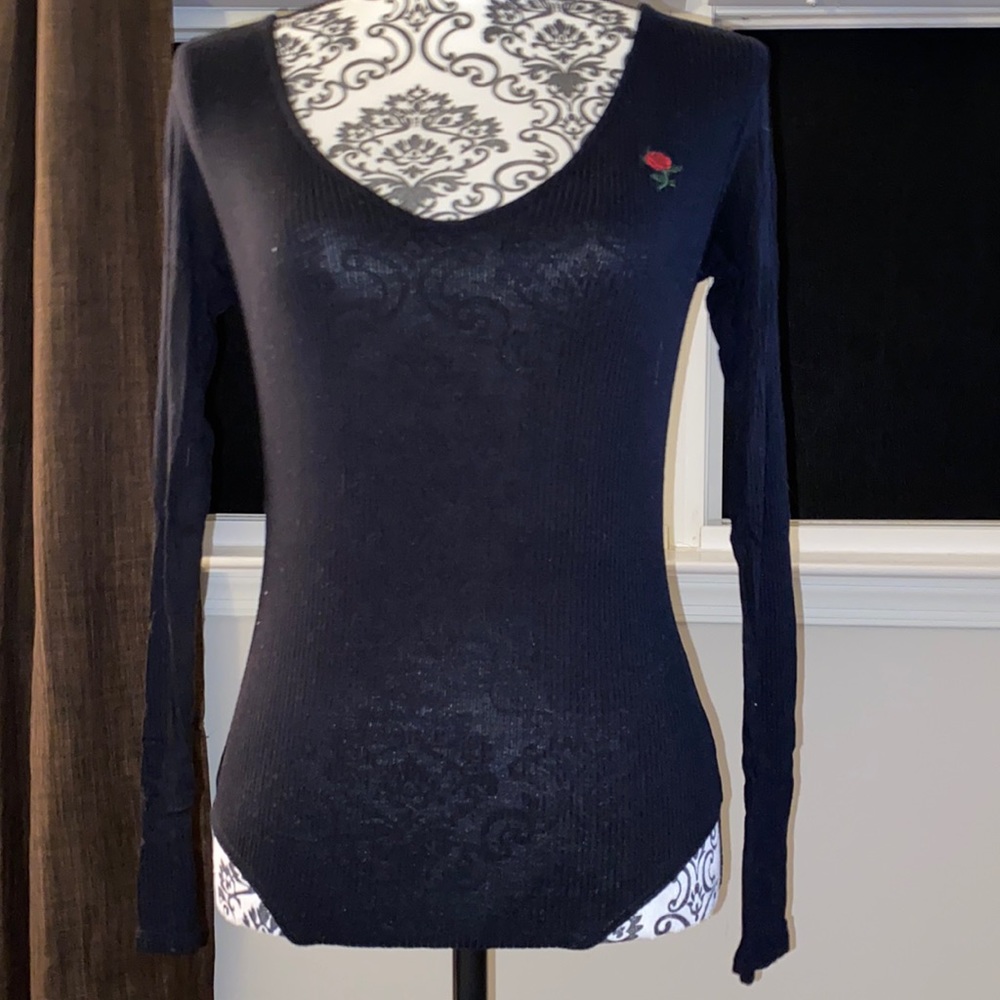 Black long sleeve rose in bordered one piece